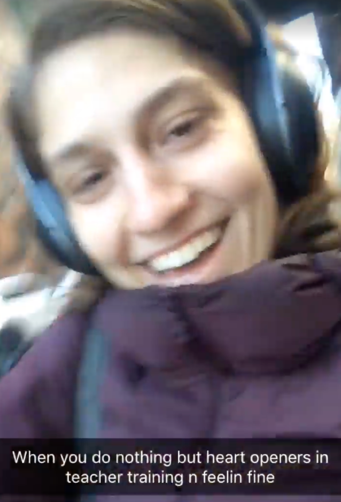 alexis with headphones and smiling